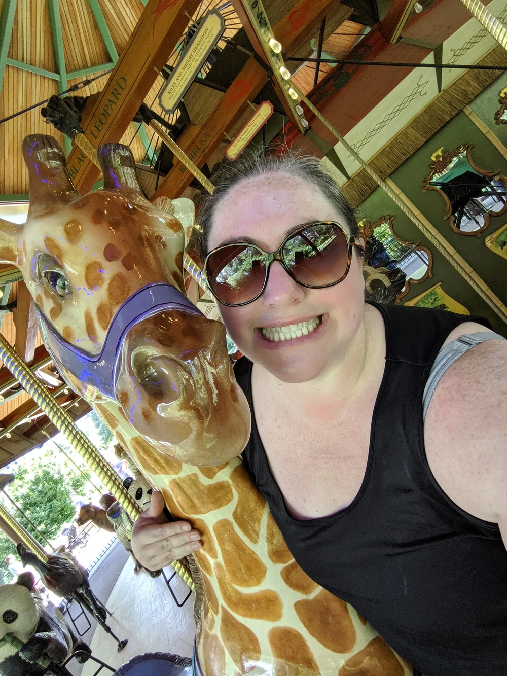 Heather with a giraffe carousel
